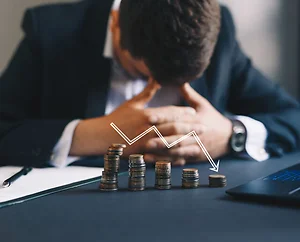 Depressed businessman lost his business. Destroyed businessman. Concept of business loss, bankruptcy and crisis.